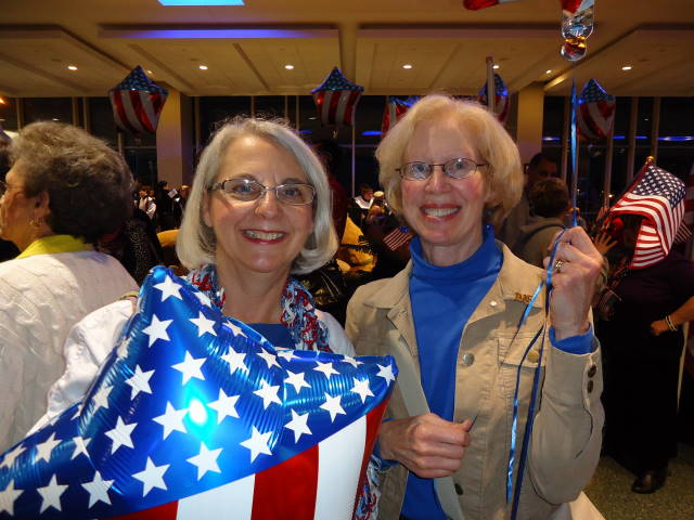 Eleanor Meisenheimer and Suzanne Graham greet veterans on return from Washington D.C.