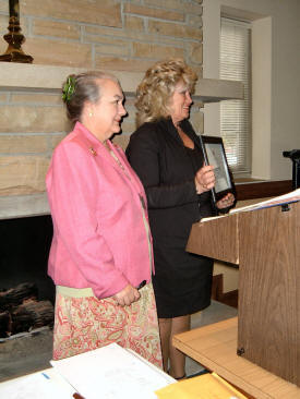 Bonny Kate Chapter Regent Ollie Ellison, presents the Media (Print) Award to Elbra Davis, Editor of the Union News Leader Newspaper