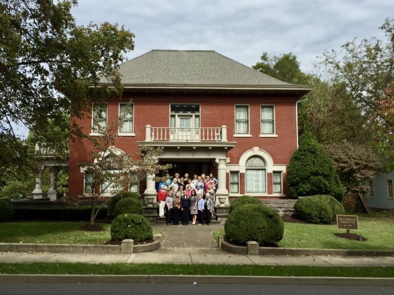 Charlotte Reeves Robertson Chapter, DAR, chapter members on the front porch of the Glenn Memorial Club House.