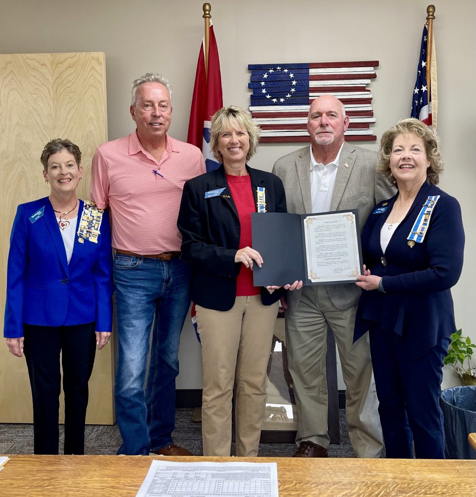 The signing of Constitution Week Proclamation with one city mayor and the county mayor.