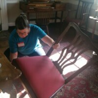 Day of Service at Blount Mansion dusting furniture