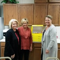 Giving donuts to Teachers for Teacher Appreciation Week